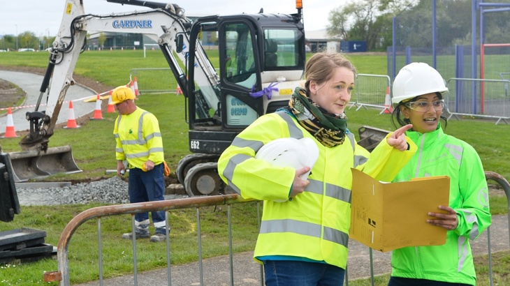 two female engineers on site at building works