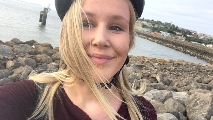 A selfie of Gwyneth by the coast