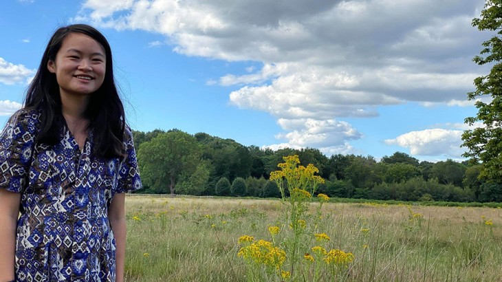 Carmen Szeto stood with yellow field behind her