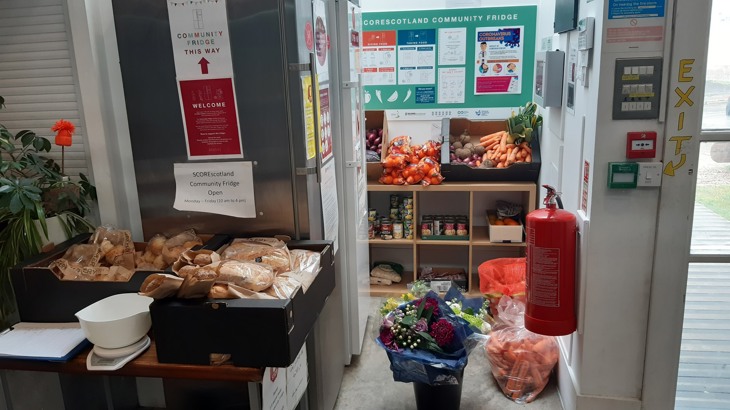 Community food fridge stocked up via cargo bike